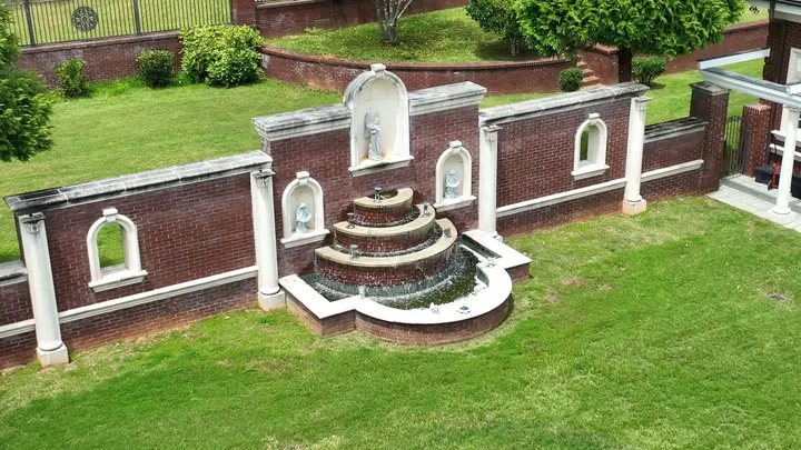 Aerial view of the garden fountain wall and lawn