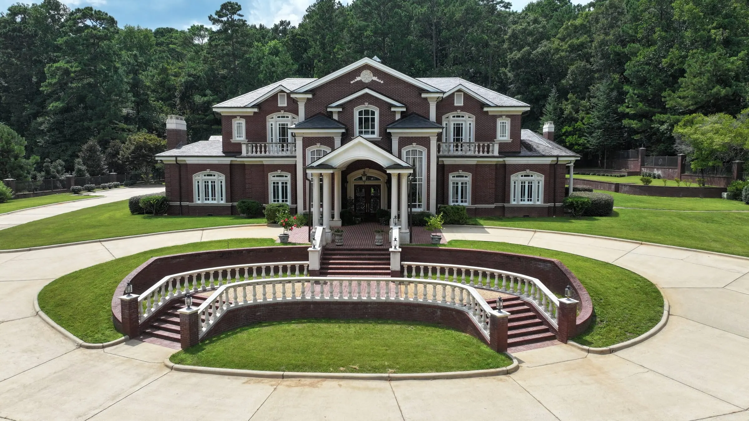 Aerial view of The Hart House and its curved entry stairs in LaGrange, Georgia
