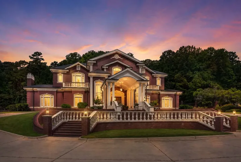 The Hart House illuminated at twilight, 601 Country Club Road, LaGrange, Georgia
